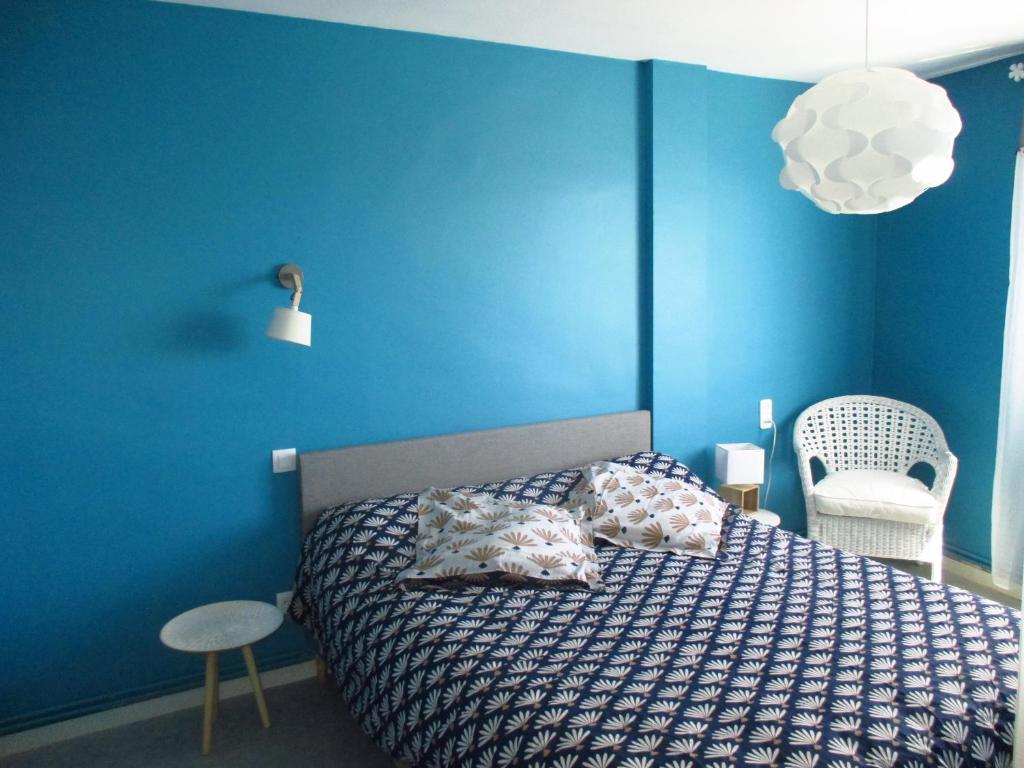 En eller flere senge i et værelse på framboise