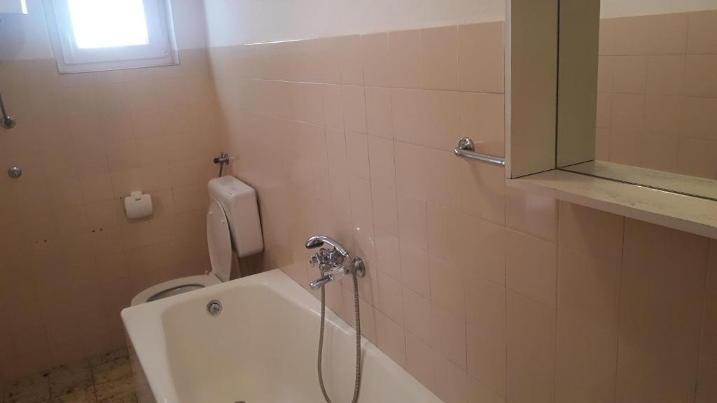 Koupelna v ubytování Apartmani Riba