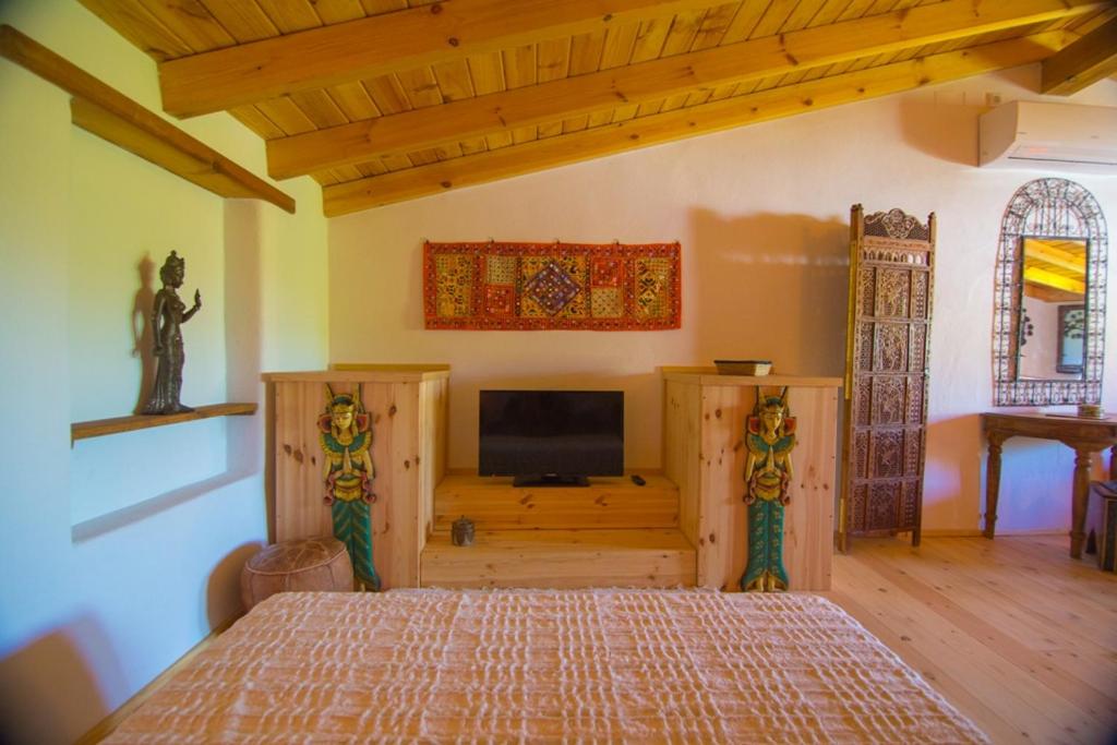 Posteľ alebo postele v izbe v ubytovaní Casa con encanto en Alájar