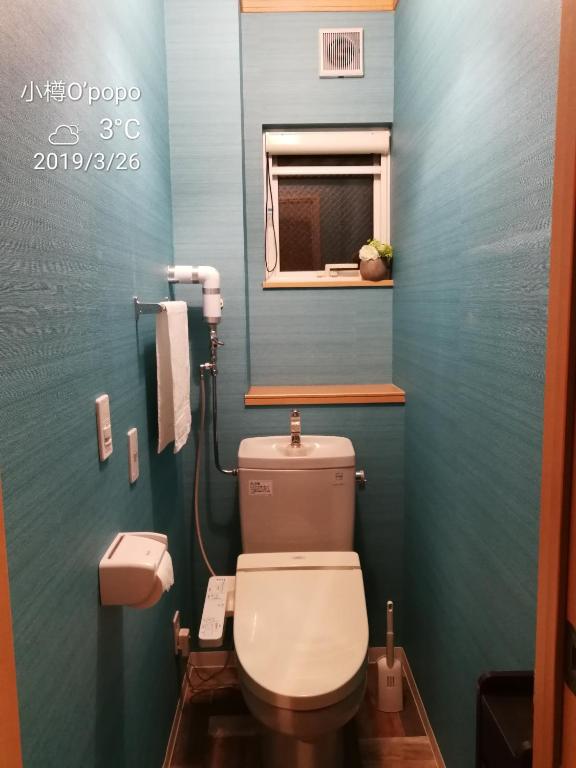 Koupelna v ubytování Opopo home 竜宮店