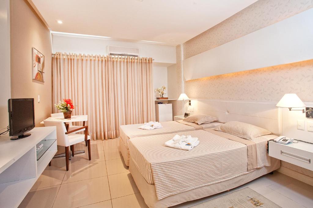 Postel nebo postele na pokoji v ubytování Bahiamar Hotel