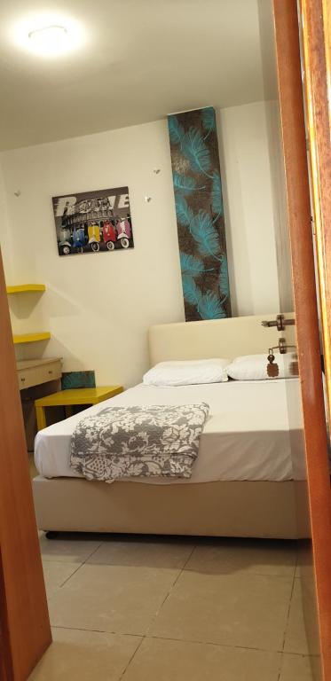 Кровать или кровати в номере Marina's Rooms