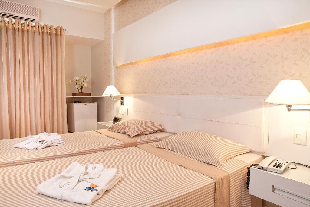 Postel nebo postele na pokoji v ubytování Bahiamar Hotel
