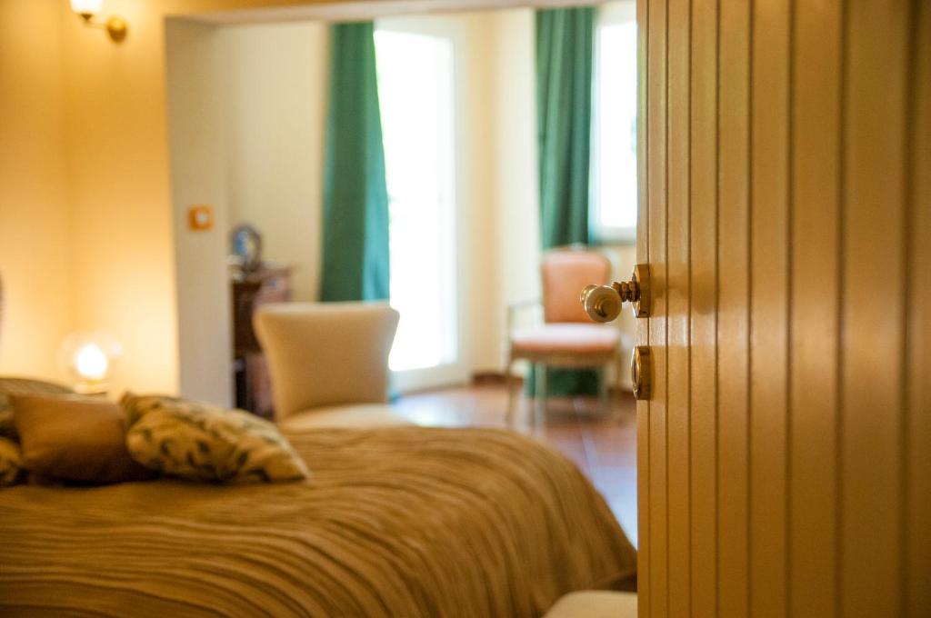 Łóżko lub łóżka w pokoju w obiekcie B&B La Villa
