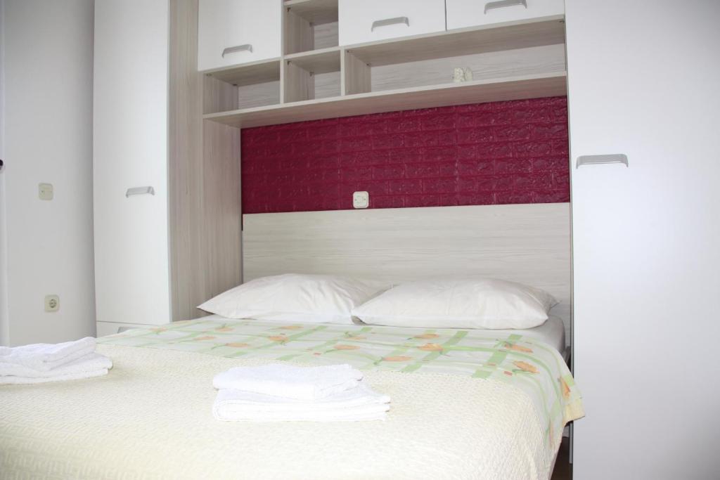 Postel nebo postele na pokoji v ubytování Guesthouse Santor