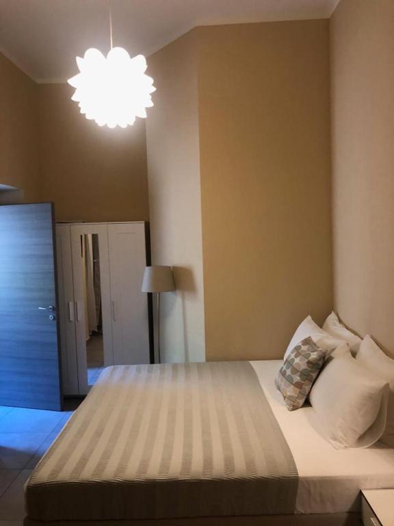 Posteľ alebo postele v izbe v ubytovaní PARADISE INN