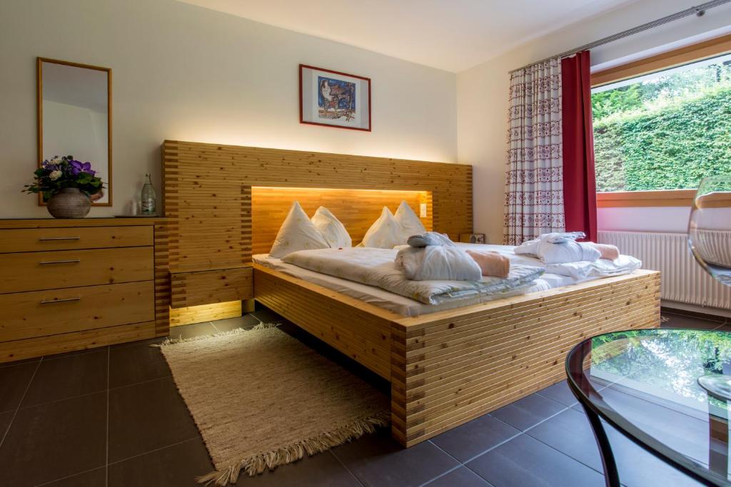 Postel nebo postele na pokoji v ubytování Hotel Cresta