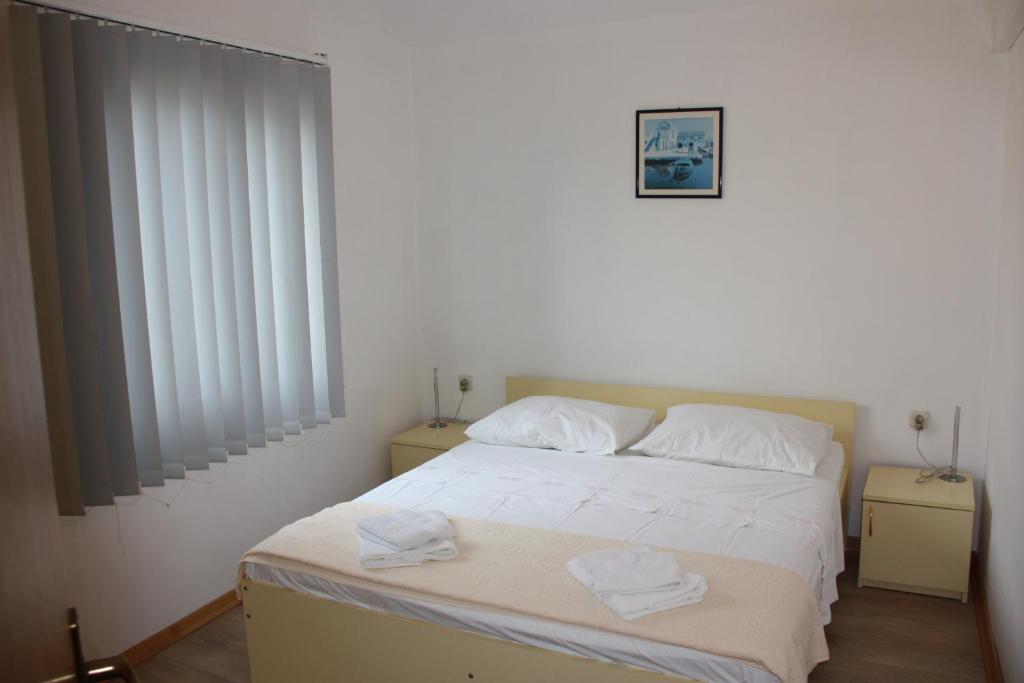 Postel nebo postele na pokoji v ubytování Guesthouse Santor