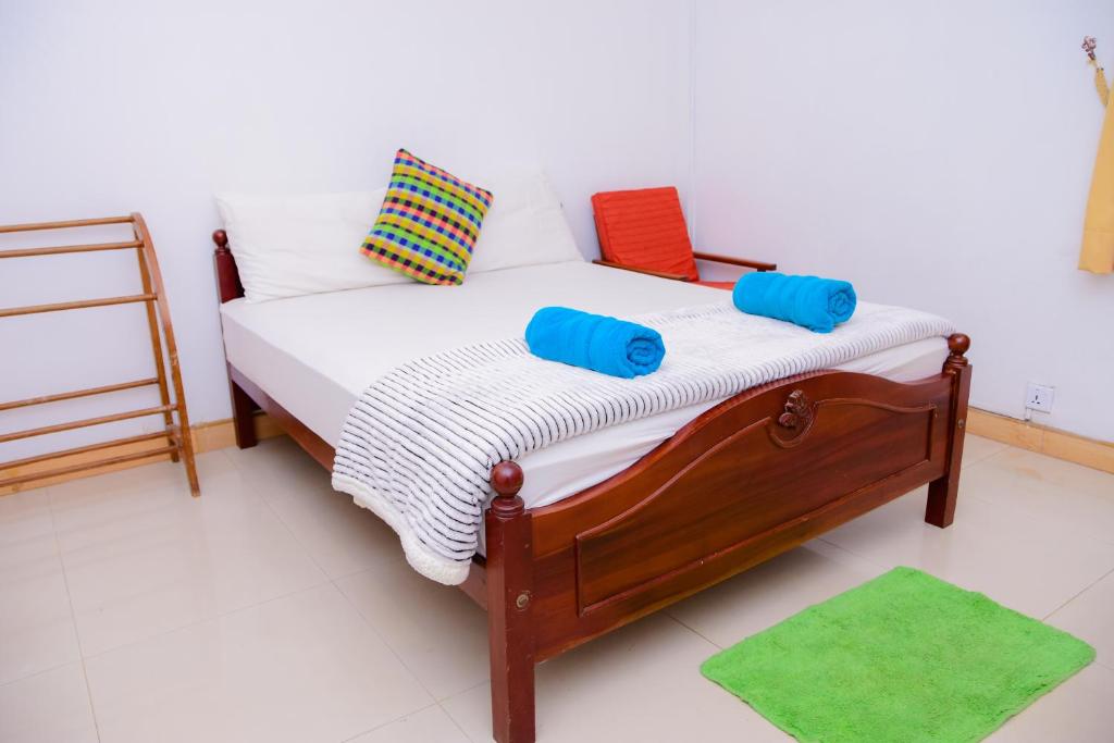 Postel nebo postele na pokoji v ubytování Homestay Garden Rest Kandy