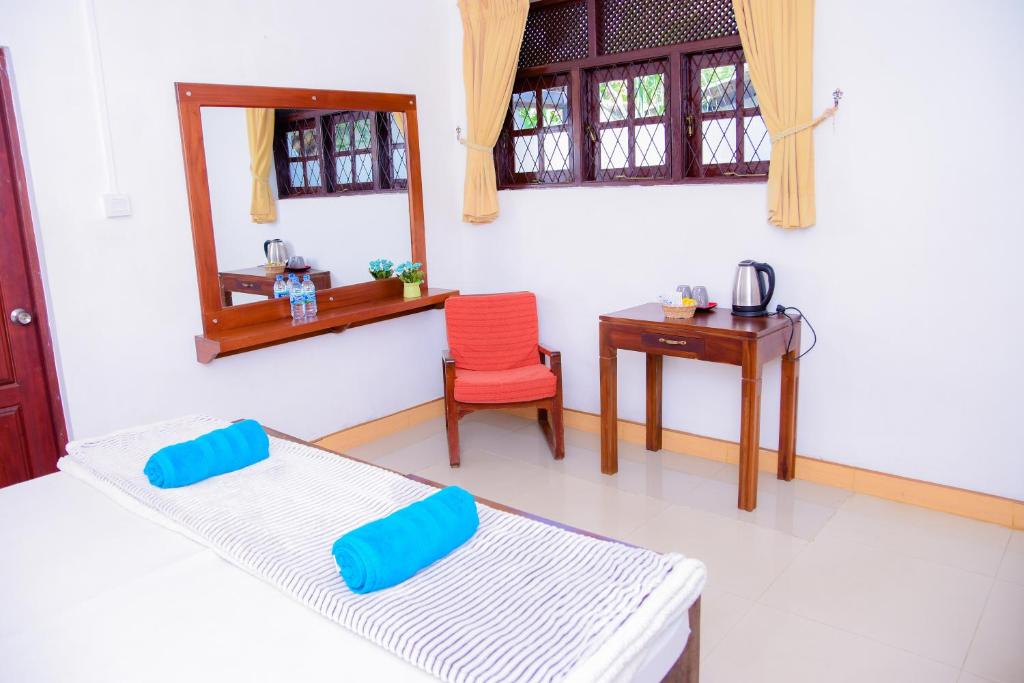 Postel nebo postele na pokoji v ubytování Homestay Garden Rest Kandy