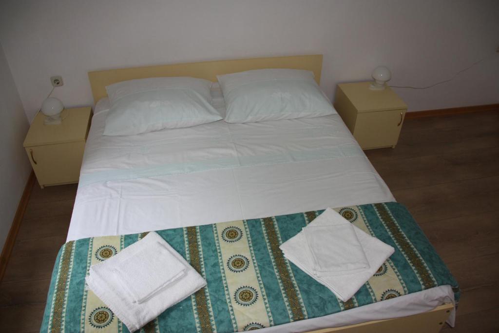 Postel nebo postele na pokoji v ubytování Guesthouse Santor
