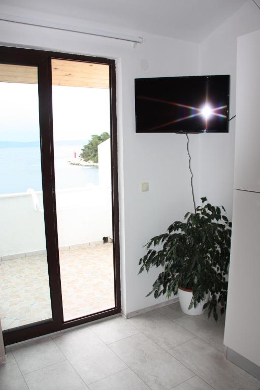 TV a/nebo společenská místnost v ubytování Guesthouse Santor