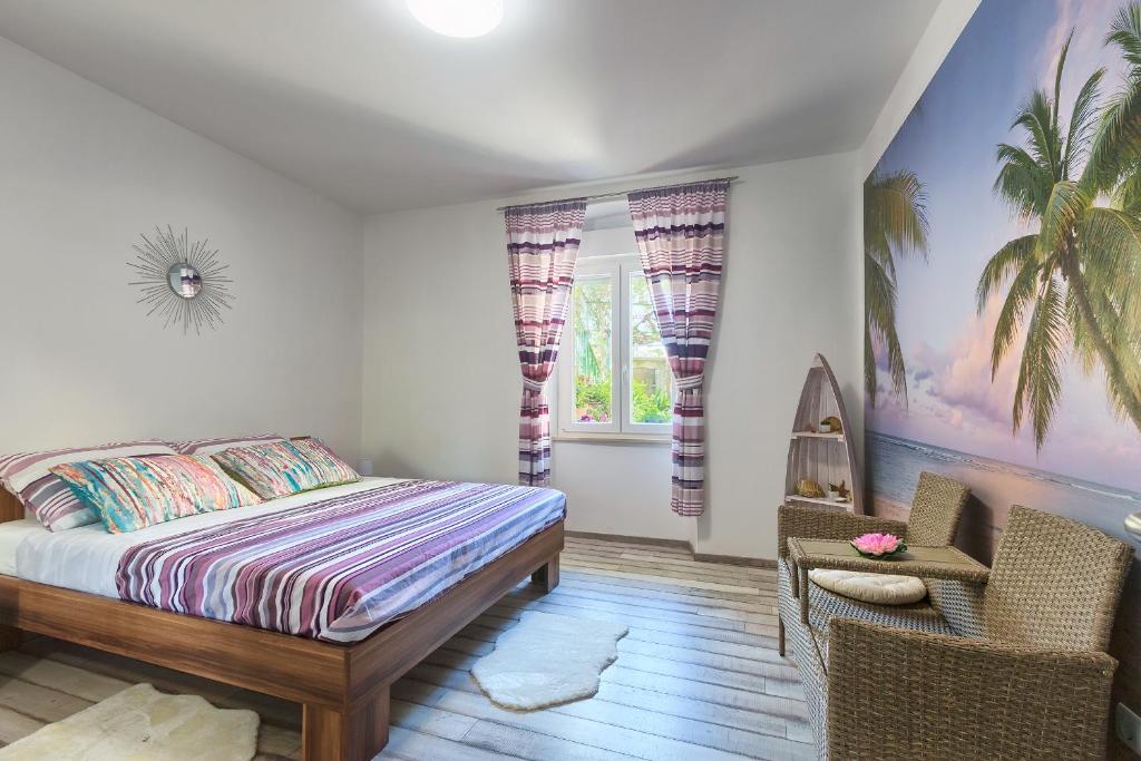 Postel nebo postele na pokoji v ubytování Apartment Amfiteatar Moris