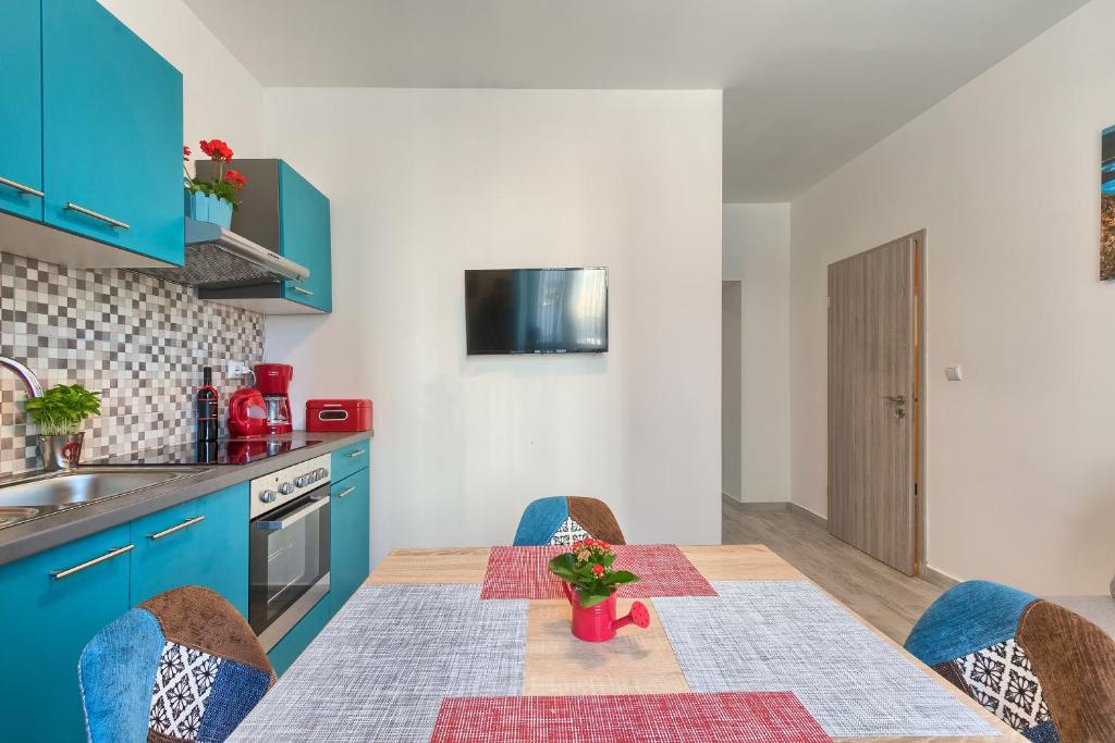Kuchyň nebo kuchyňský kout v ubytování Apartment Amfiteatar Moris
