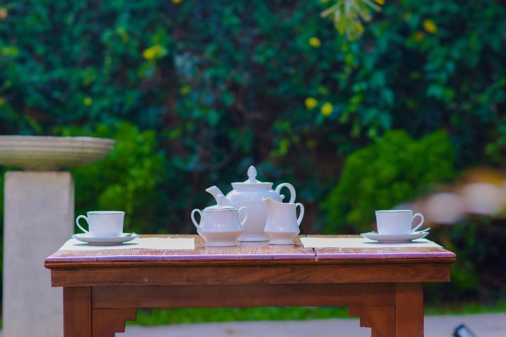 Příslušenství pro přípravu čaje a kávy v ubytování Homestay Garden Rest Kandy