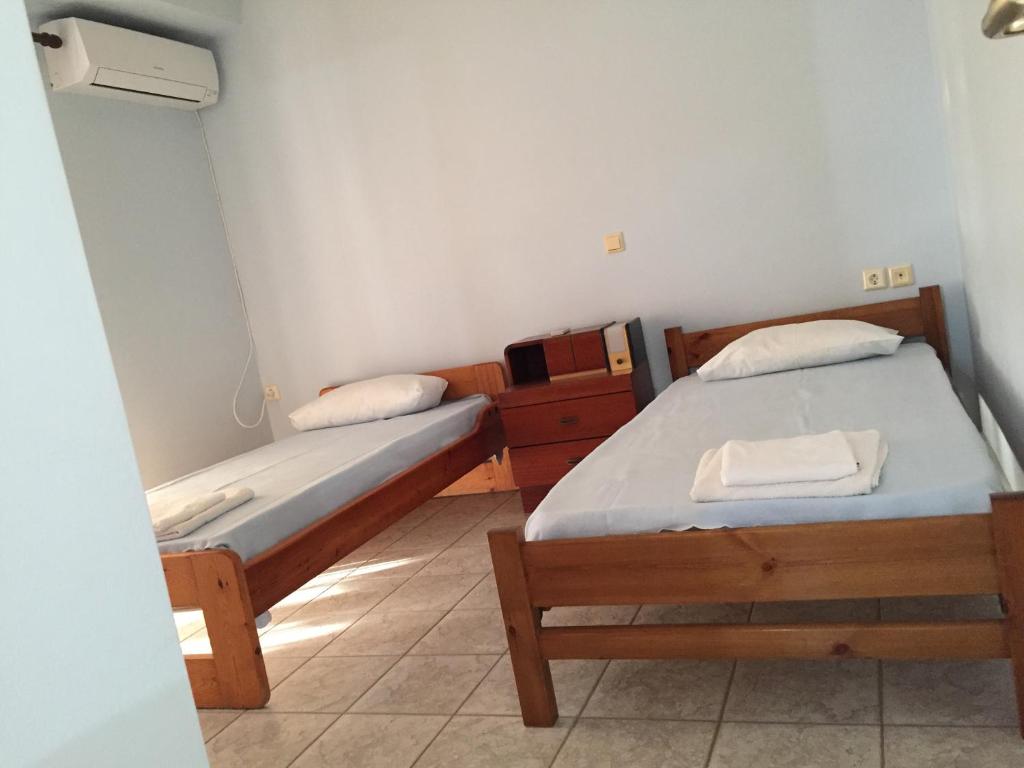 Postel nebo postele na pokoji v ubytování Nonika’s House