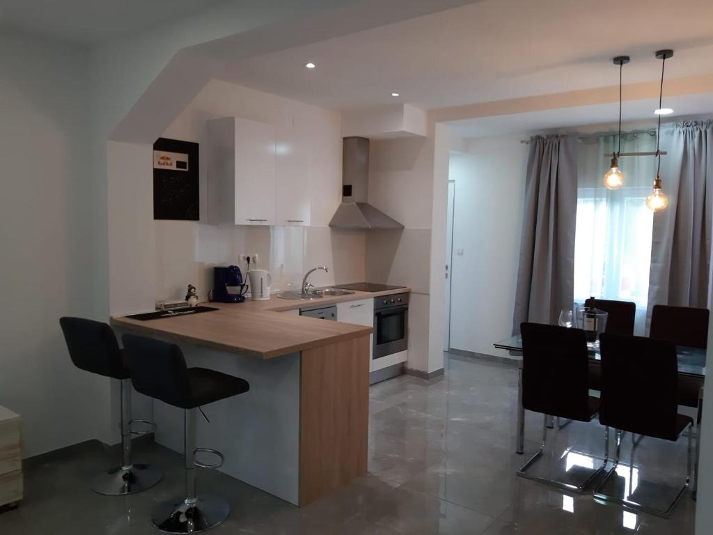 Kuchyň nebo kuchyňský kout v ubytování Apartman Noah