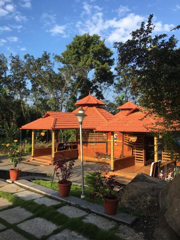 Κήπος έξω από το Great Hornbill Serviced Villa , Nilambur