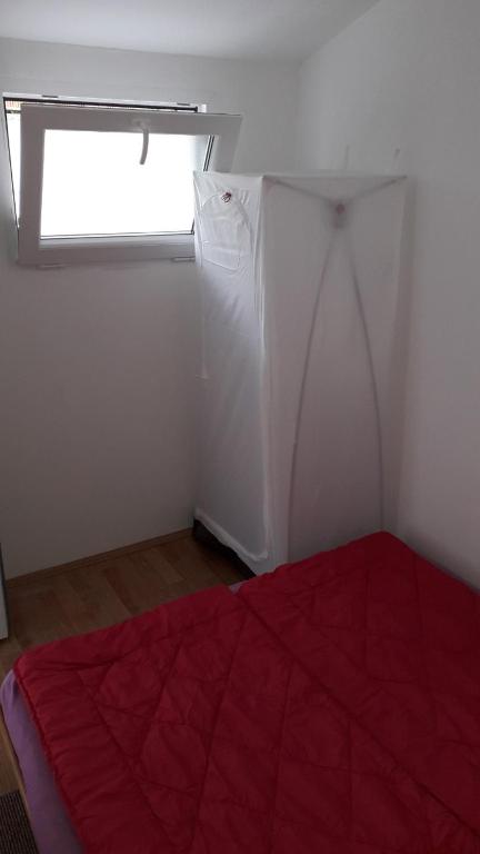 Ένα ή περισσότερα κρεβάτια σε δωμάτιο στο Hostel Trajan