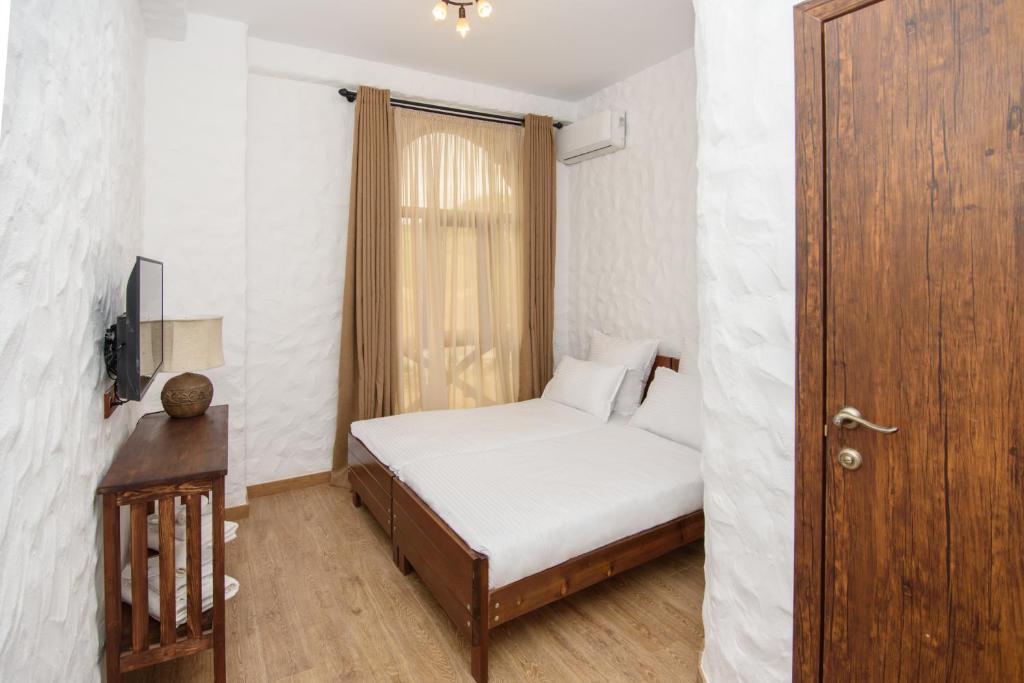 Postel nebo postele na pokoji v ubytování Golden Fleece