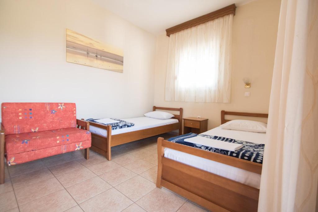 Łóżko lub łóżka w pokoju w obiekcie acquablue apartments