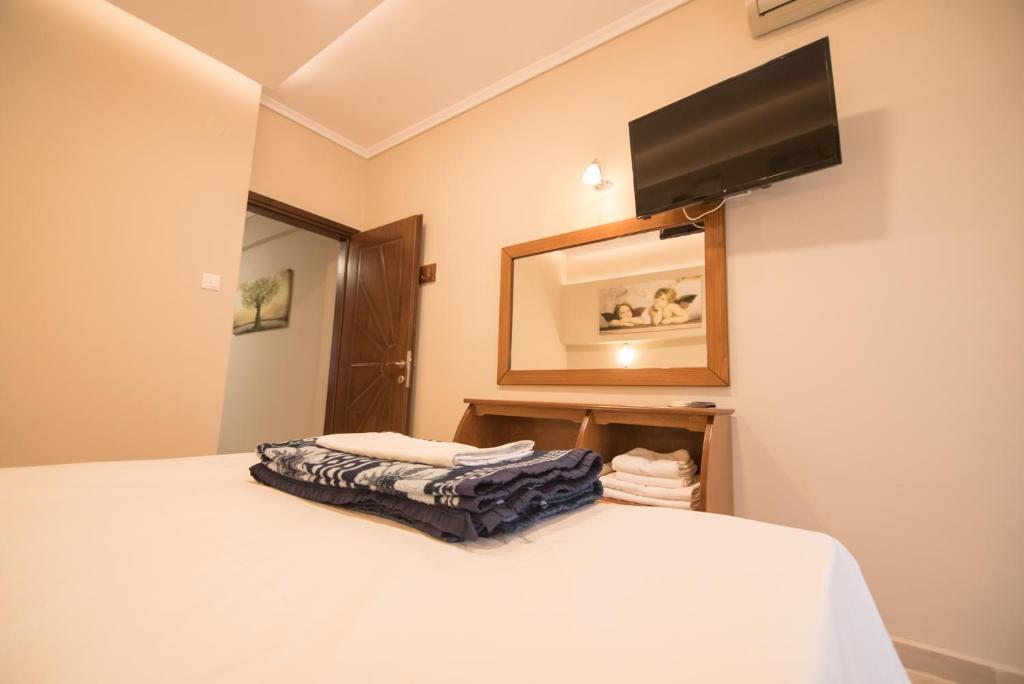 Łóżko lub łóżka w pokoju w obiekcie acquablue apartments