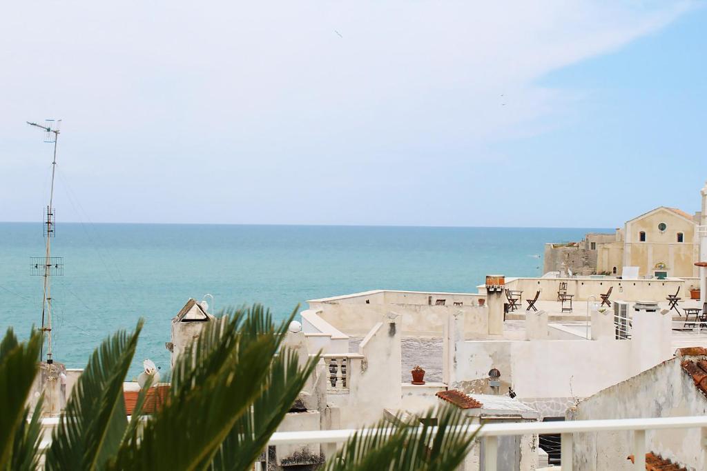 a view of a city with the ocean in the background at Estlevante B&B in Vieste