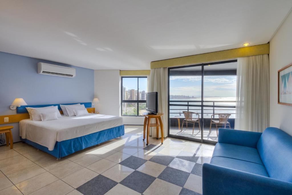 Postel nebo postele na pokoji v ubytování Iate Plaza Hotel