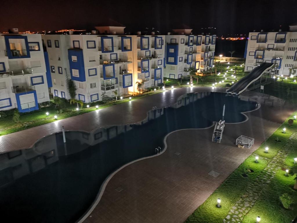 Bazén v ubytování Kariat Cabo - Appartement Charmant, Climatisé avec Vue Piscine nebo v jeho okolí