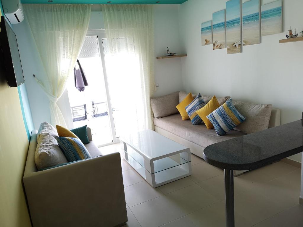 Posezení v ubytování Kariat Cabo - Appartement Charmant, Climatisé avec Vue Piscine
