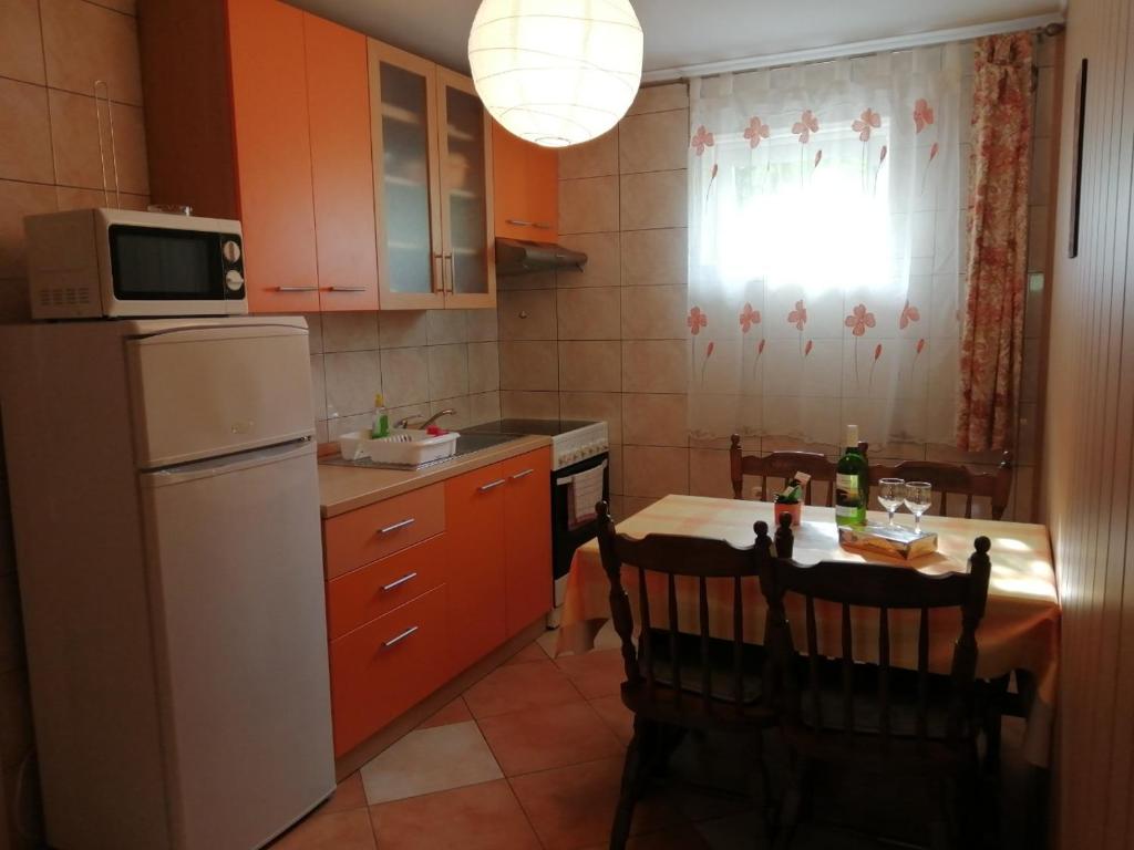 Kuchyň nebo kuchyňský kout v ubytování Jovich Apartments 1