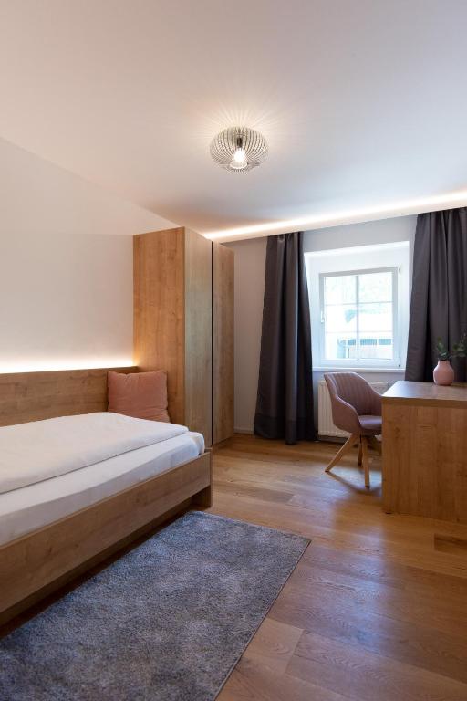 Letto o letti in una camera di Gasthof Fischer Dörnbach