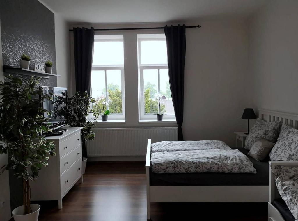 Postel nebo postele na pokoji v ubytování Krásný byt v centru Děčína