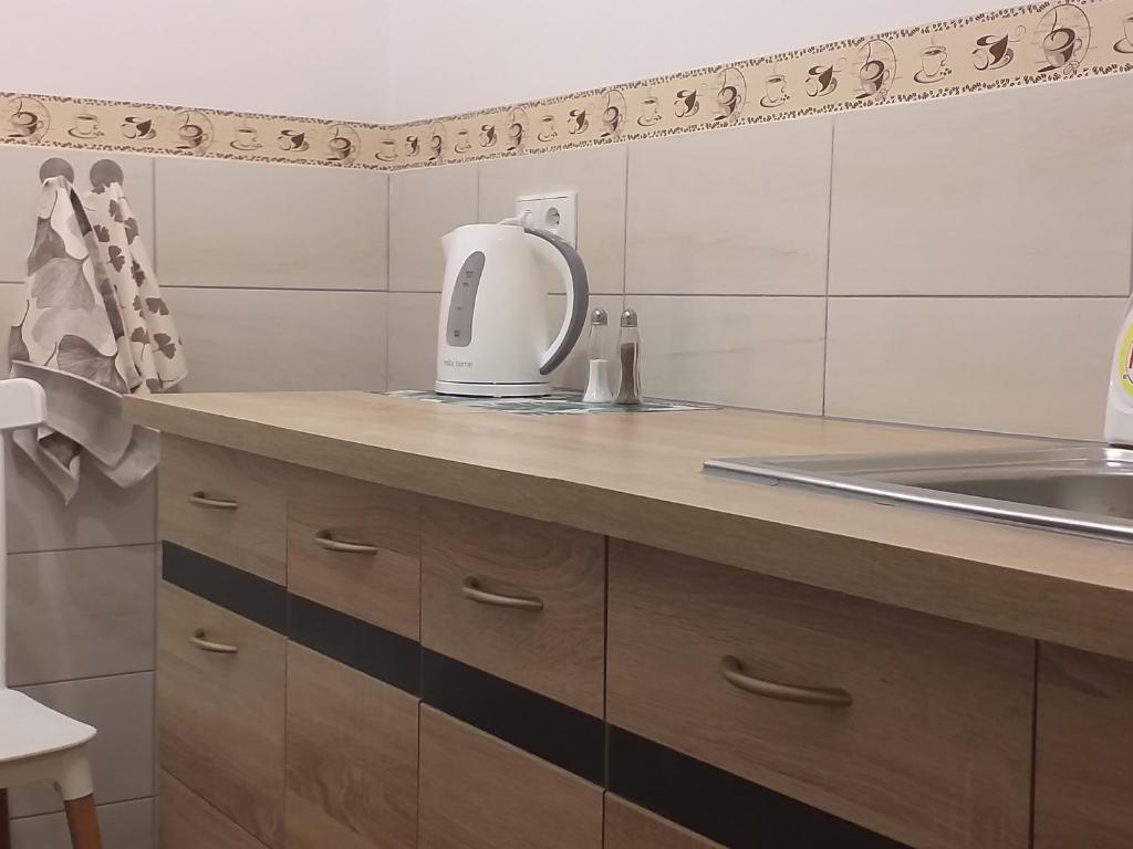 Kuchyň nebo kuchyňský kout v ubytování STARY SPICHLERZ