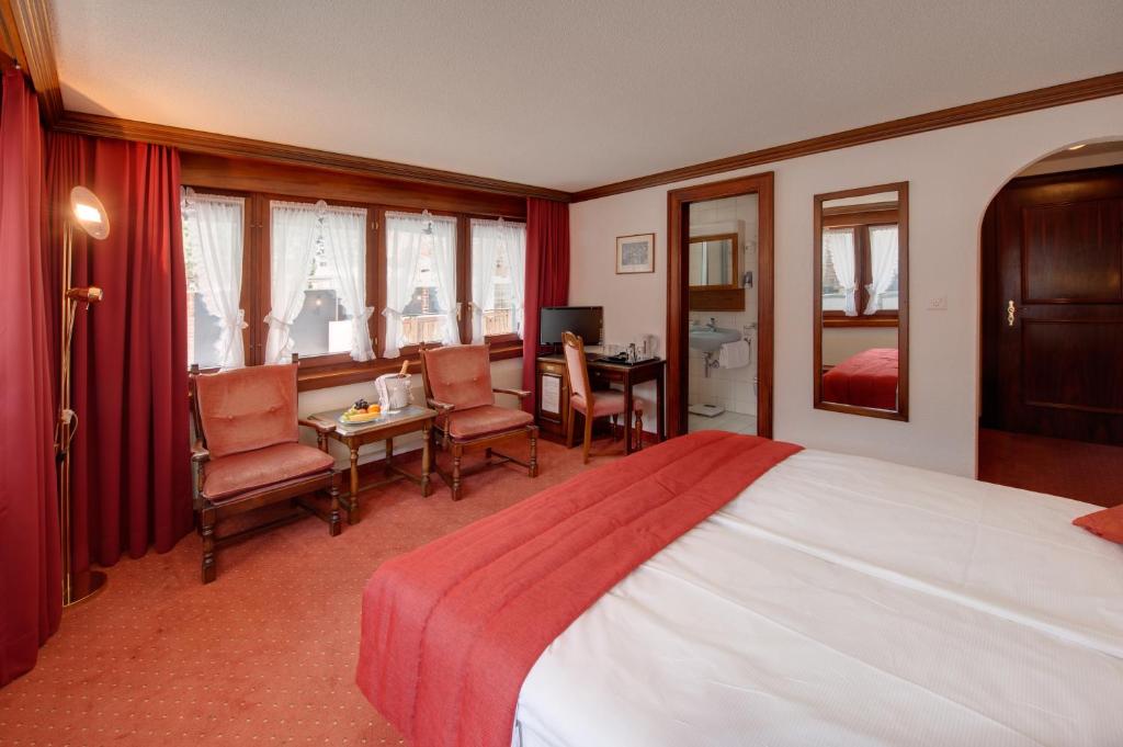 Letto o letti in una camera di Hotel Astoria
