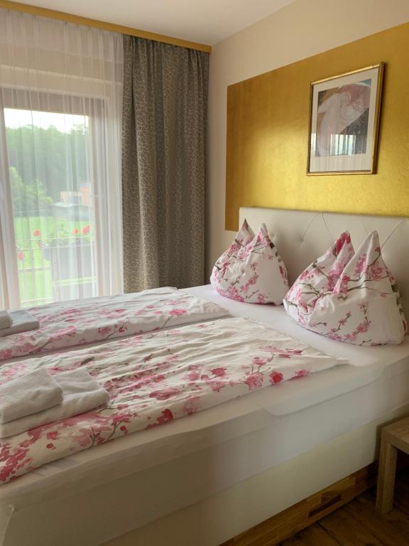 Katil atau katil-katil dalam bilik di Stockers kleines Dorfhotel