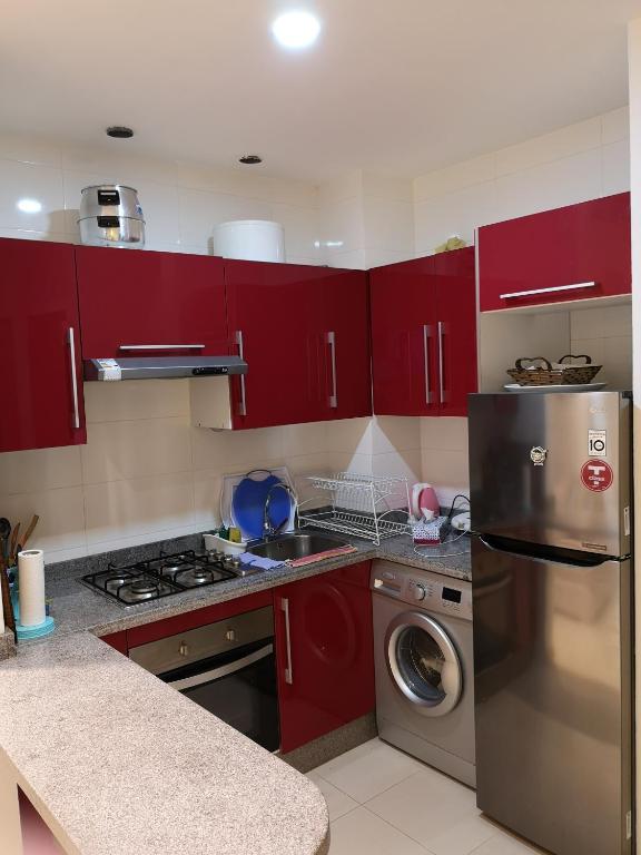 Kuchyň nebo kuchyňský kout v ubytování Kariat Cabo - Appartement Charmant, Climatisé avec Vue Piscine