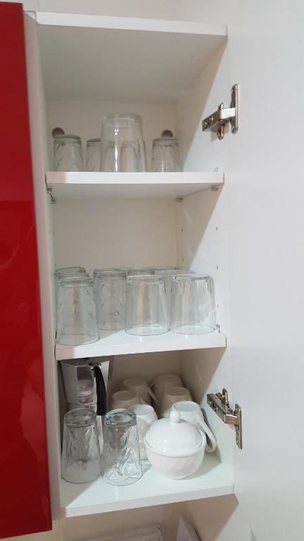 Kuchyň nebo kuchyňský kout v ubytování Kariat Cabo - Appartement Charmant, Climatisé avec Vue Piscine