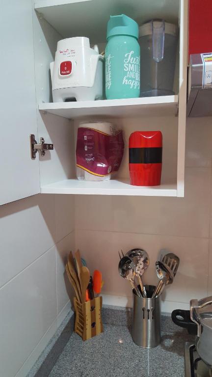 Kuchyň nebo kuchyňský kout v ubytování Kariat Cabo - Appartement Charmant, Climatisé avec Vue Piscine