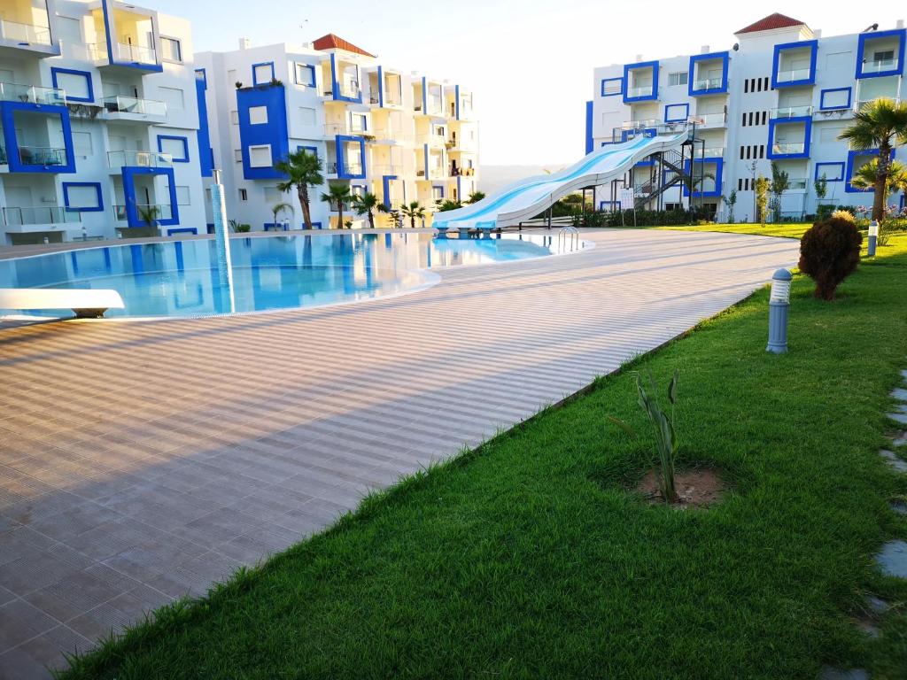 Bazén v ubytování Kariat Cabo - Appartement Charmant, Climatisé avec Vue Piscine nebo v jeho okolí