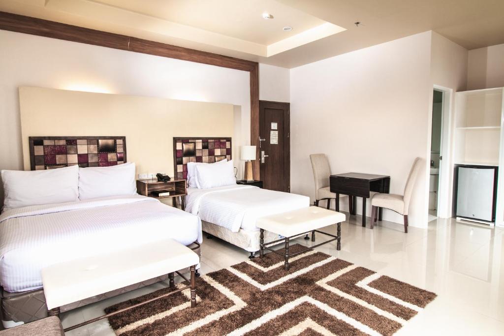 Postel nebo postele na pokoji v ubytování Sierra Hotel