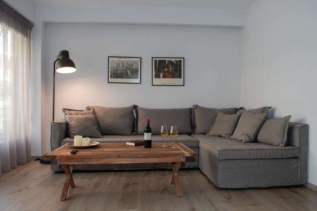 a living room with a couch and a table at Urban 35 in Chania Town