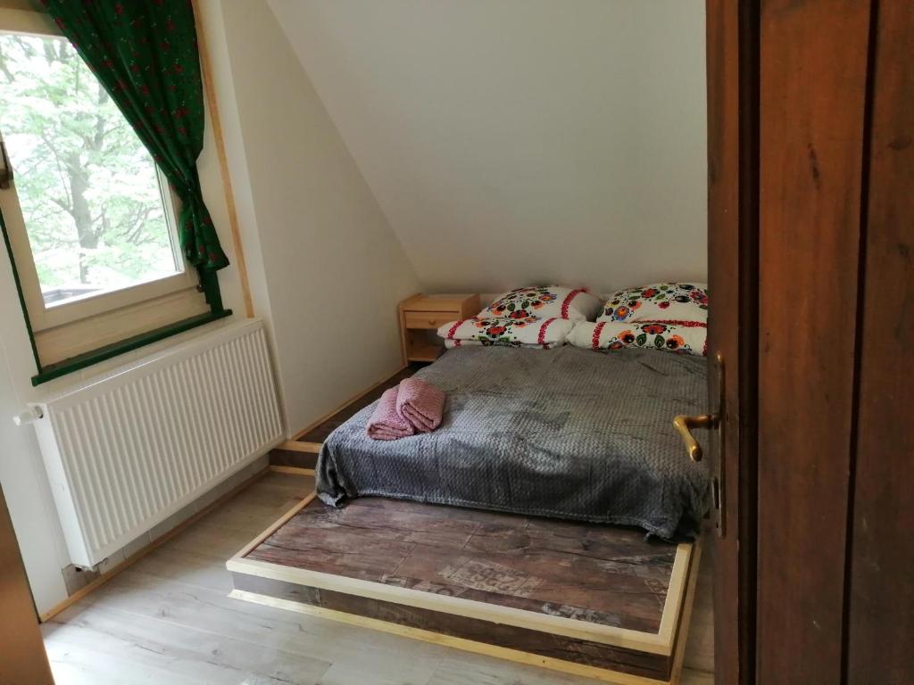 Postel nebo postele na pokoji v ubytování Willa Wiślok