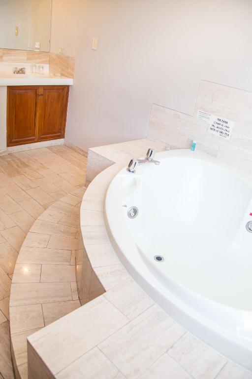 Koupelna v ubytování Hotel Park Suites
