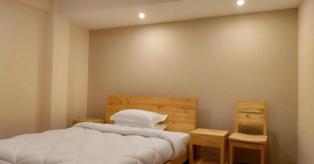 Postel nebo postele na pokoji v ubytování Sayami Home