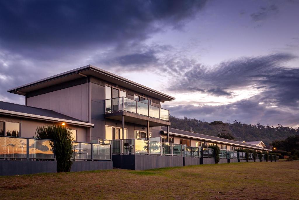 a large building with a lot of windows at Beachfront Bicheno in Bicheno