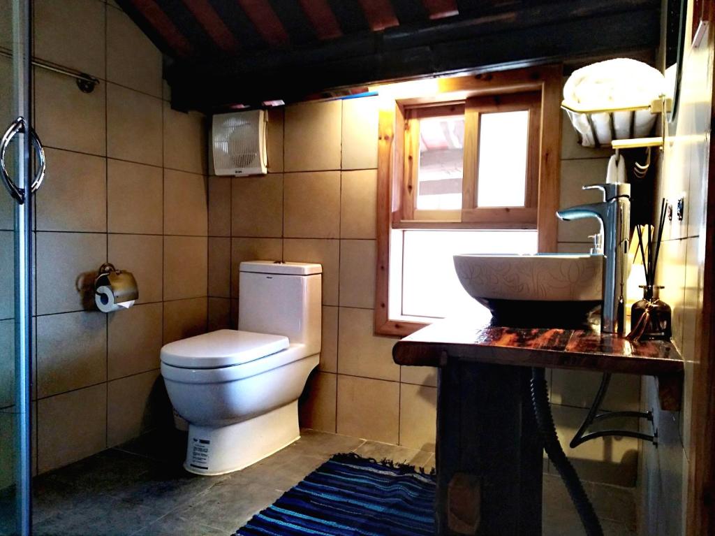 Koupelna v ubytování Lost World Sanjiang Guest house
