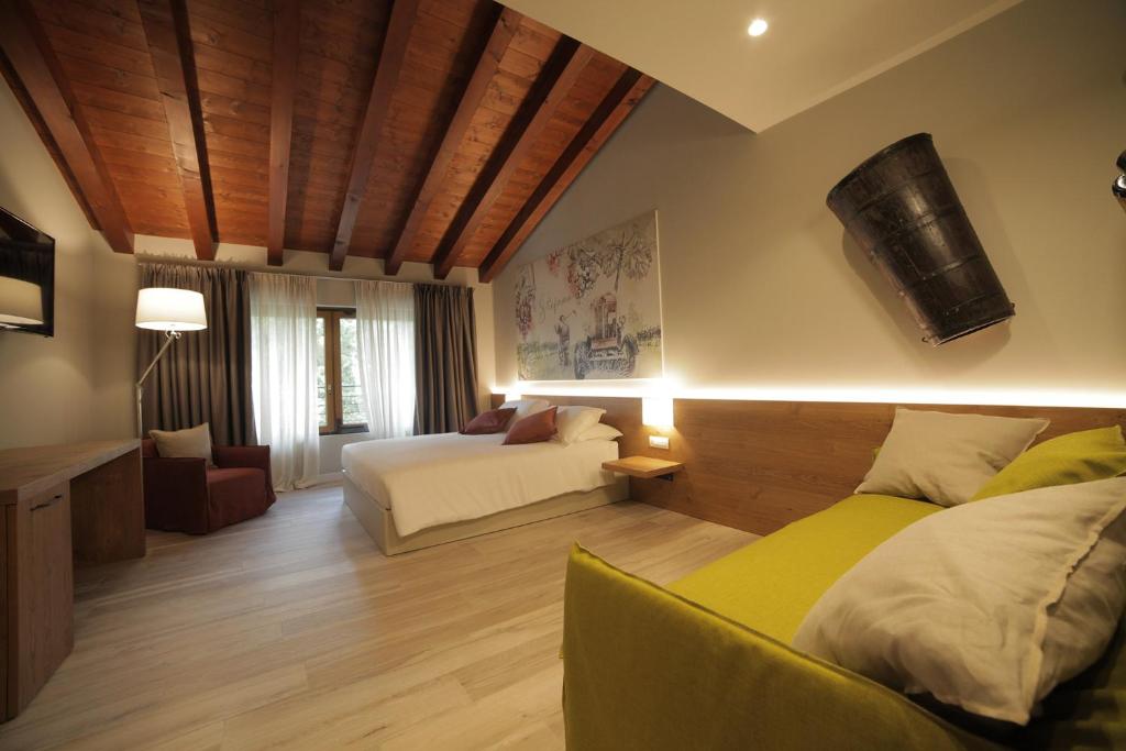 Postel nebo postele na pokoji v ubytování AGRITURISMO ACINATICO WINE RELAIS