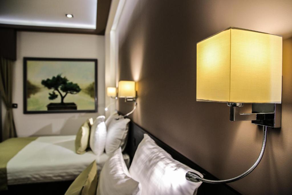 Garni Hotel Zen free parking - Resim 12