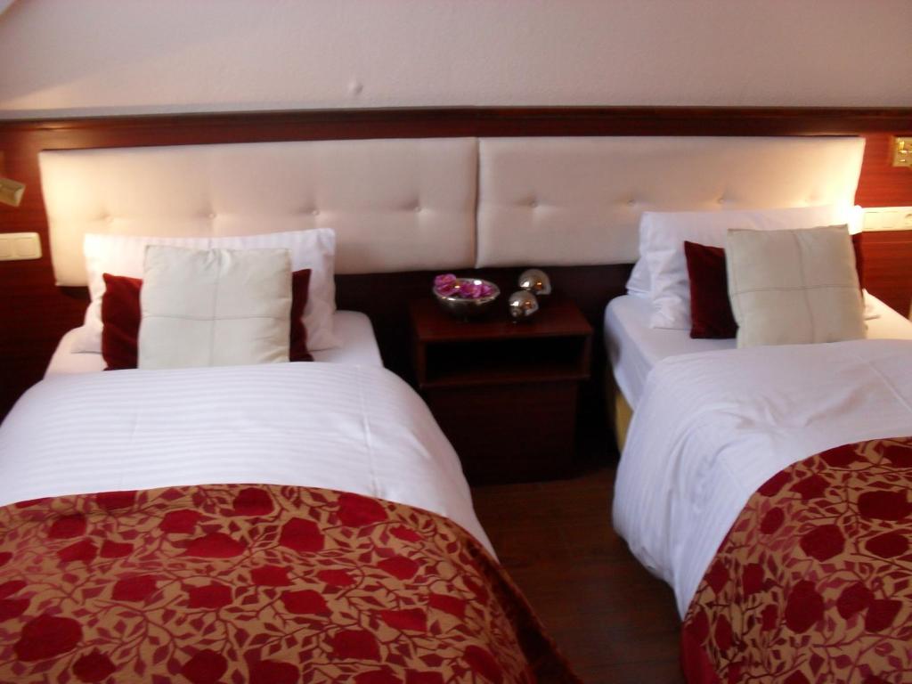 Letto o letti in una camera di In Piazza